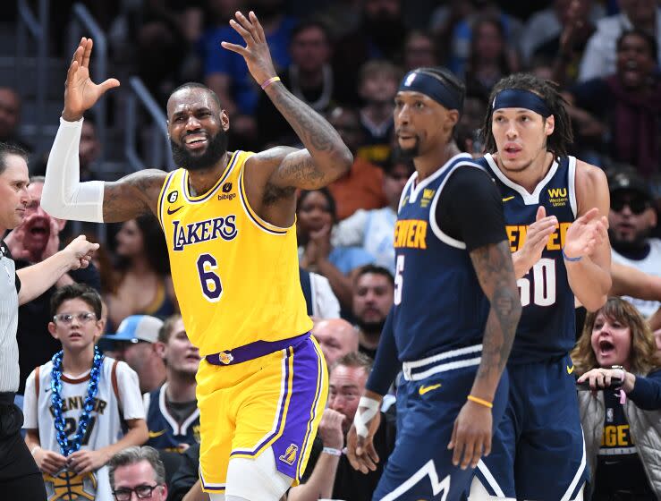 Denver, Colorado May 16, 2023-Lakers LeBron James wants a foul called against the Nuggets.