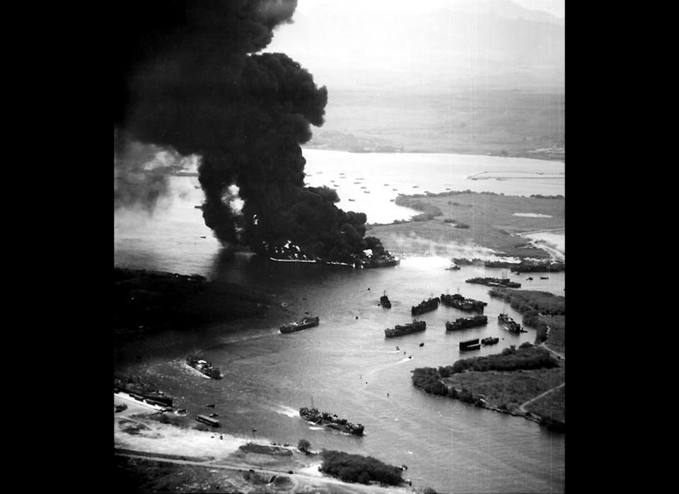 In this photo taken May 21, 1944, the bombing of U.S. Navy vessels in the West Loch area of Pearl Harbor is seen in this photo provided by the Naval History & Heritage Command. Though the incident became known as "The Second Pearl Harbor Disaster," it has never received the attention garnered by the Japanese surprise attack, in part because its details were kept secret for almost two decades.