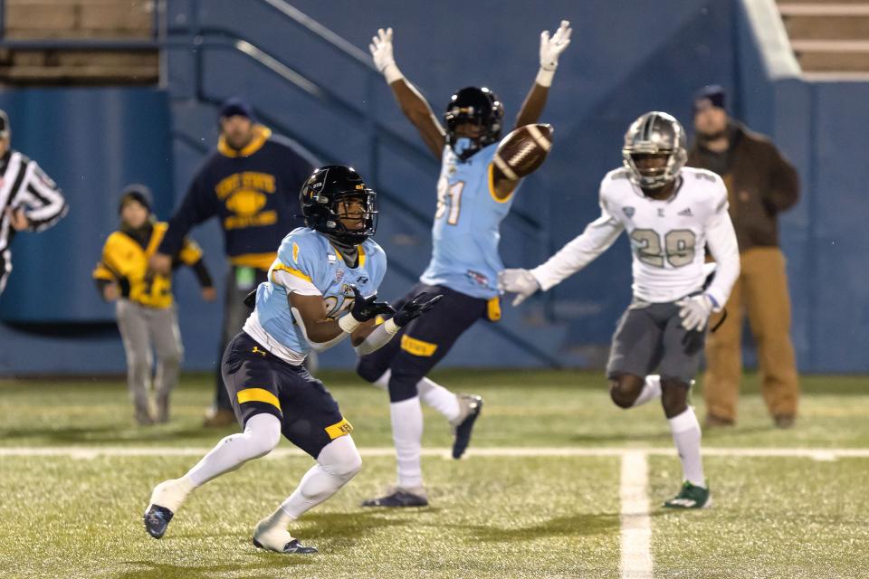 Kent State wide receiver Ja'Shaun Poke catches a pass for a first-half touchdown against Eastern Michigan, Wednesday, Nov. 16, 2022 in Kent.