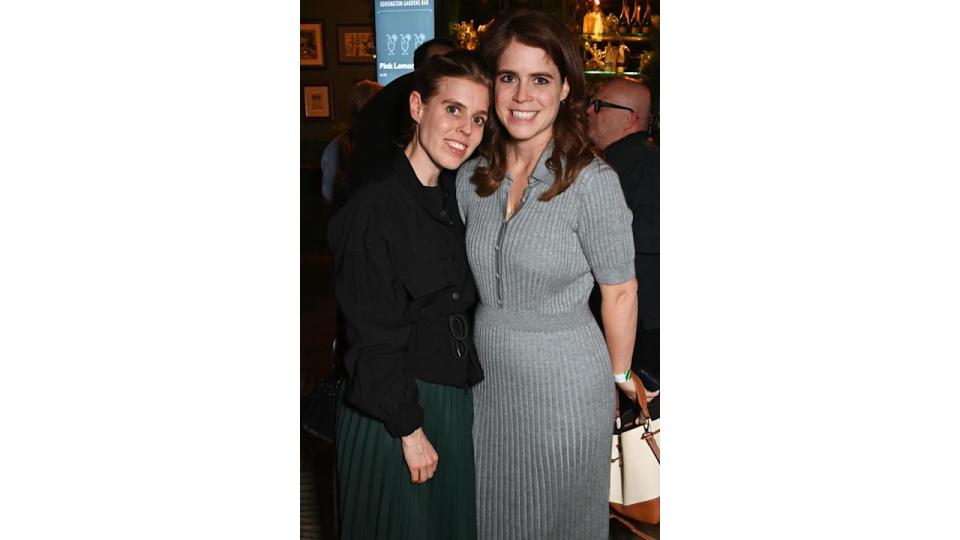 Princess Beatrice and Princess Eugenie embracing