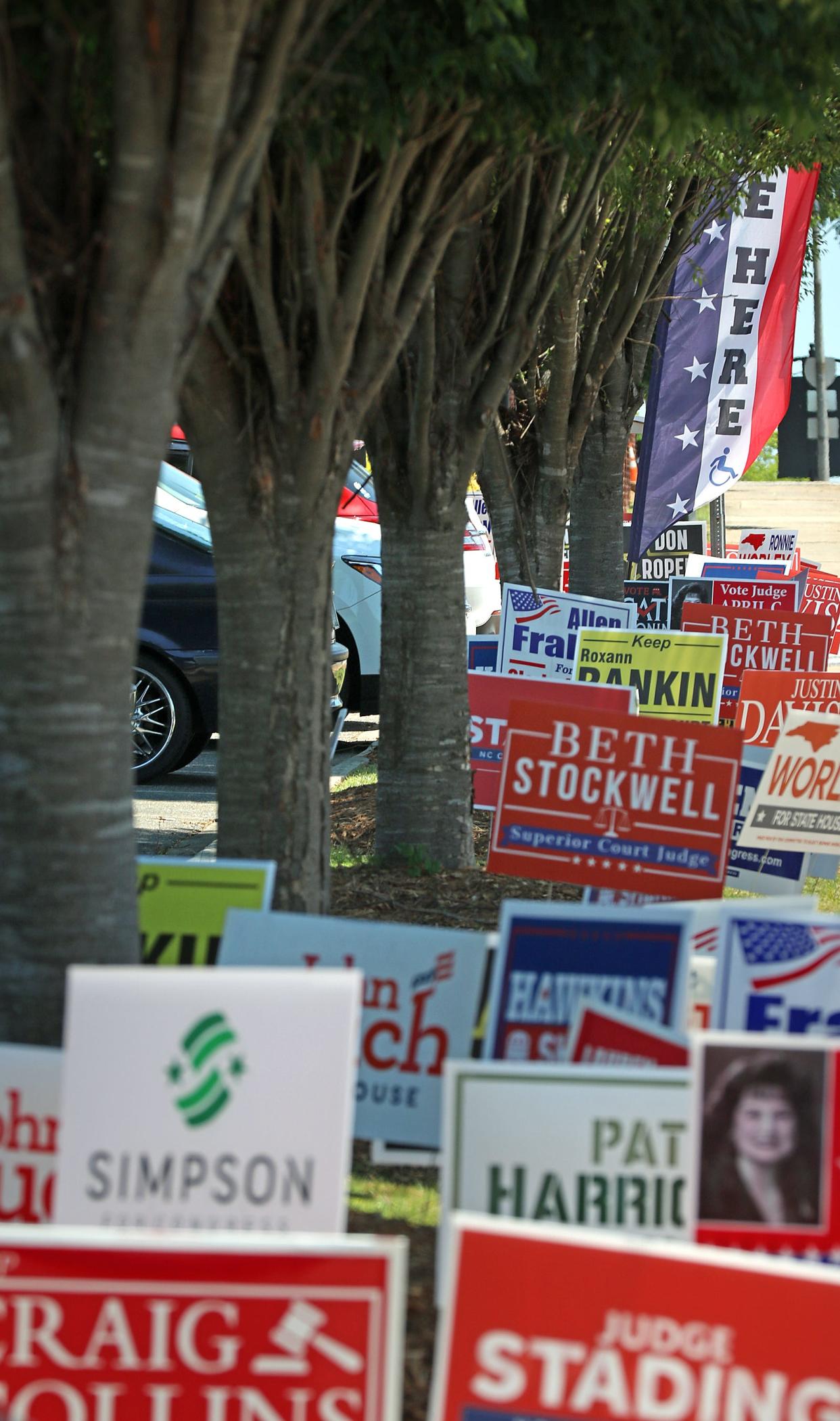 Political signs line the sidewalk in front the Gaston County Board of Elections on West Franklin Boulevard Tuesday afternoon, May 10, 2022.