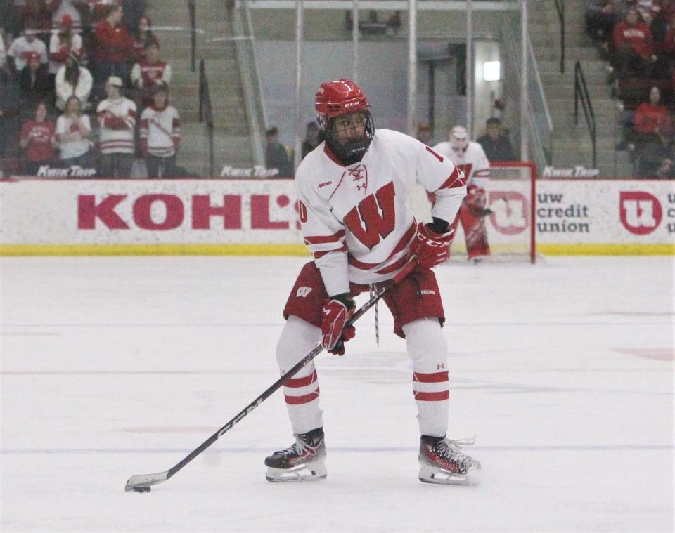 Wisconsin forward Laila Edwards controls the puck during the first period of the team's game with Minnesota on Friday February 16, 2024 at La Bahn Arena in Madison, Wisconsin.