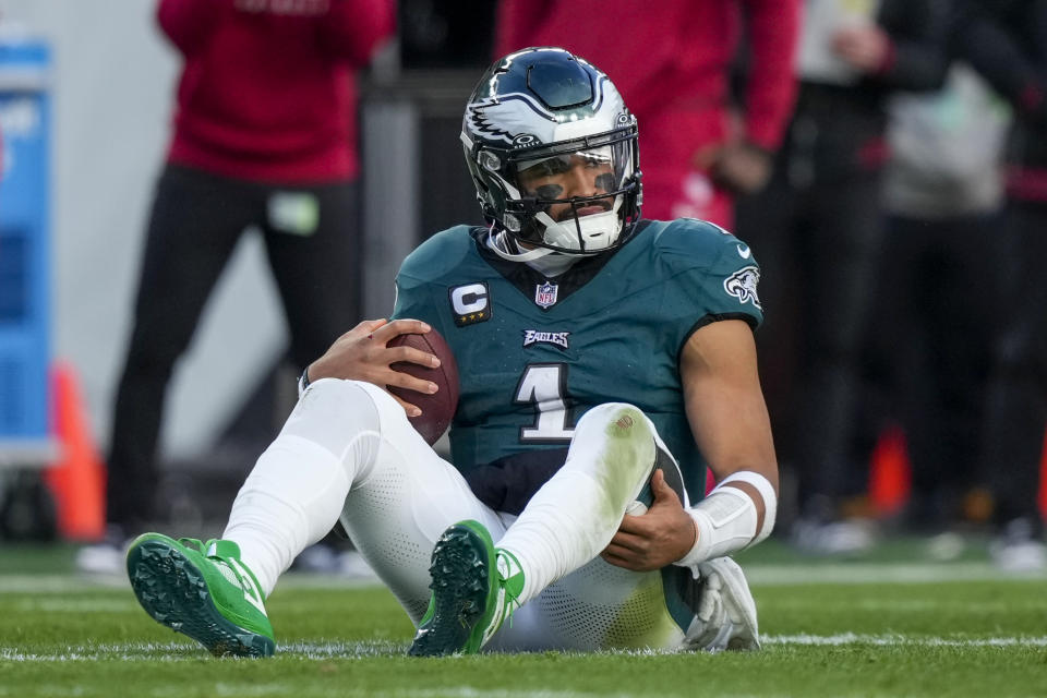 Philadelphia Eagles quarterback Jalen Hurts reacts after being sacked by the Arizona Cardinals during the second half of an NFL football game, Sunday, Dec. 31, 2023, in Philadelphia. (AP Photo/Matt Slocum)