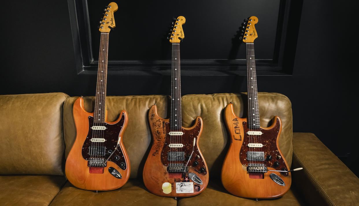  Michael Landau's "Coma" Stratocaster, surrounded on both sides by Fender replicas 