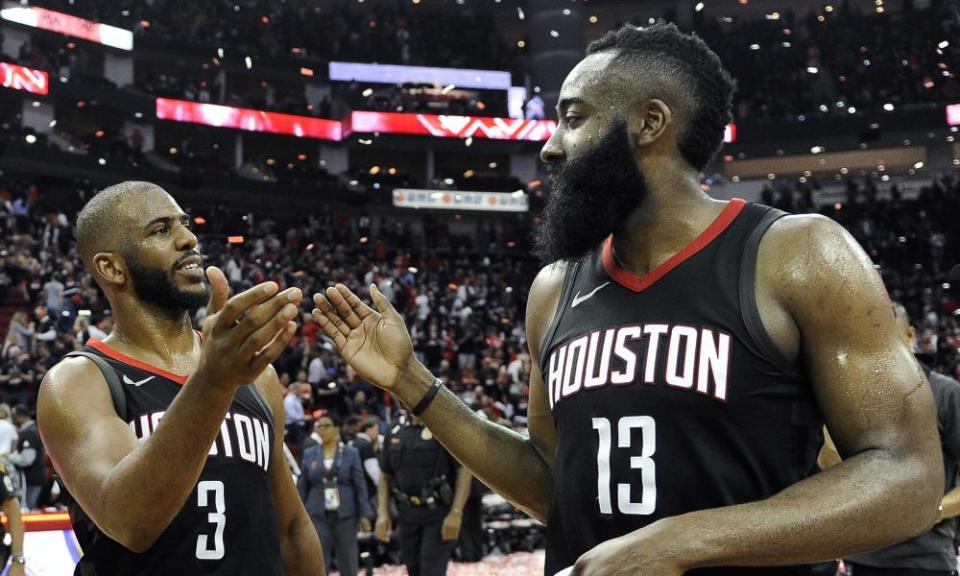 Houston Rockets guard Chris Paul and James Harden celebrate the team’s win over the Utah Jazz.