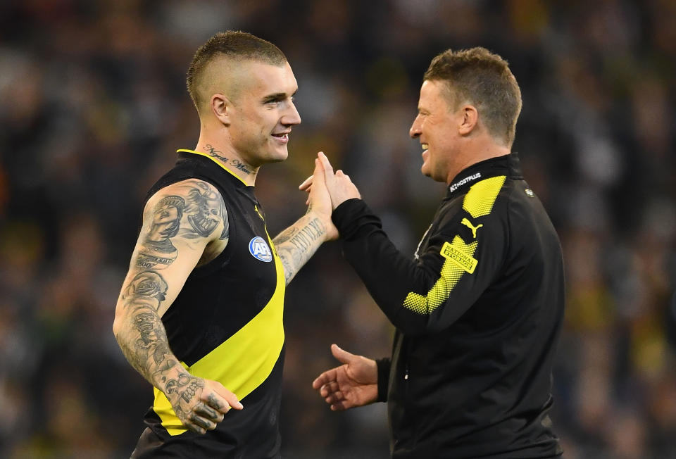 MELBOURNE, AUSTRALIA - SEPTEMBER 21:  Dustin Martin and Tigers head coach Damien Hardwick shake hands before the start of the AFL Preliminary Final match between the Richmond Tigers and the Collingwood Magpies on September 21, 2018 in Melbourne, Australia.  (Photo by Quinn Rooney/Getty Images)