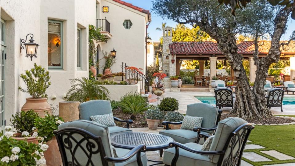 There are several outdoor seating areas perfect for entertaining. - Credit: Michael Andrew Photography