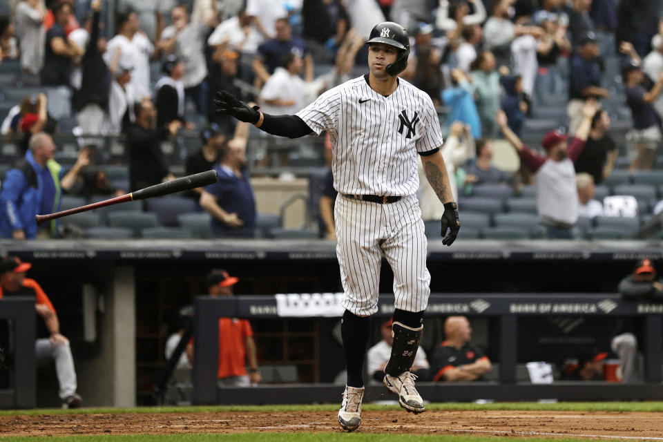 New York Yankees' Gary Sanchez throws his bat after hitting a grand slam against the Baltimore Orioles during the second inning of a baseball game on Sunday, Sept. 5, 2021, in New York. (AP Photo/Adam Hunger)
