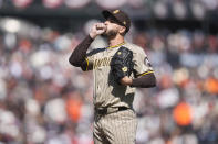 San Diego Padres pitcher Dylan Cease waits for a conference on the mound during the sixth inning of a baseball game against the San Francisco Giants in San Francisco, Friday, April 5, 2024. (AP Photo/Eric Risberg)