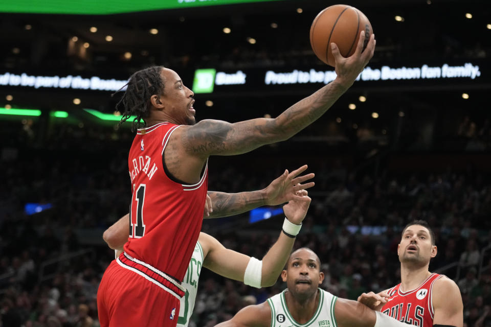 Chicago Bulls forward DeMar DeRozan drives to the basket against the Boston Celtics during the first half of an NBA basketball game, Monday, Jan. 9, 2023, in Boston. (AP Photo/Charles Krupa)