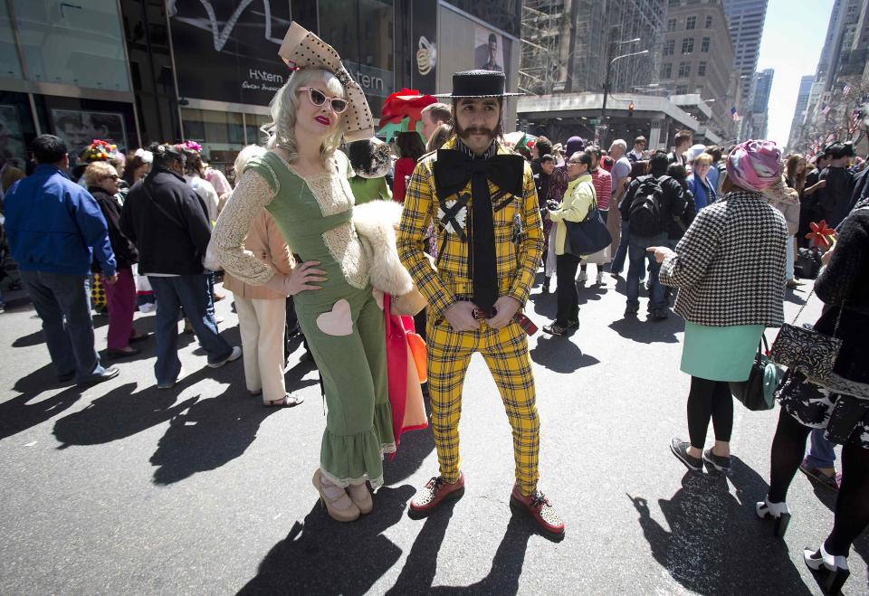 People dressed in costume attend the annual Easter Bonnet Parade in New York