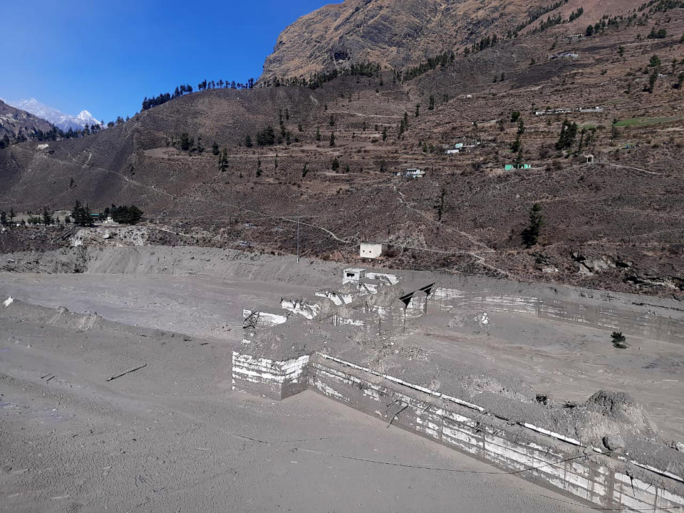 A view of the damaged Dhauliganga hydropower project at Reni village in Chamoli district after portion of Nanda Devi glacier broke off in Tapovan area of the northern state of Uttarakhand, Sunday, Feb.7, 2021. (AP Photo)