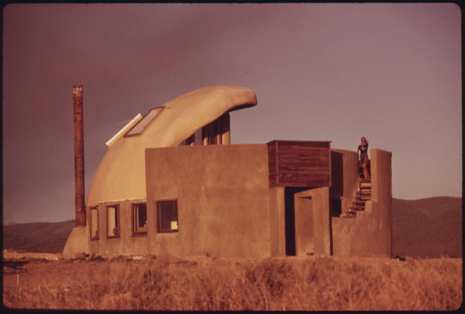 Architect and experimental house builder Michael Reynolds who lives near Taos, New Mexico, used tires, empty steel beer and soft drink cans as some of the materials used to build the structure, with a goal of building homes 20% cheaper than conventional methods at the time.