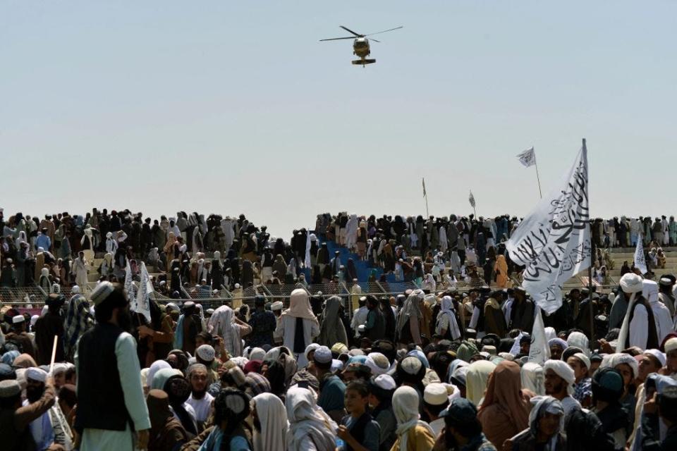 Taliban supporters gather to celebrate the US withdrawal of all its troops out of Afghanistan, in Kandahar on September 1, 2021 following the Talibans military takeover of the country.