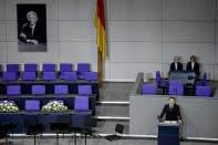 French President Emmanuel Macron delivers a speech during a state ceremony to commemorate late former German finance minister Wolfgang Schaeuble in the German parliament in Berlin, Germany, Monday, Nov.22, 2024. (AP Photo/Markus Schreiber)