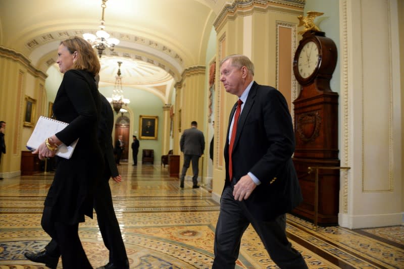 U.S. Senator Lindsey Graham (R-SC) walks to the Senate floor for the start of the Senate impeachment trial of U.S. President Donald Trump in Washington