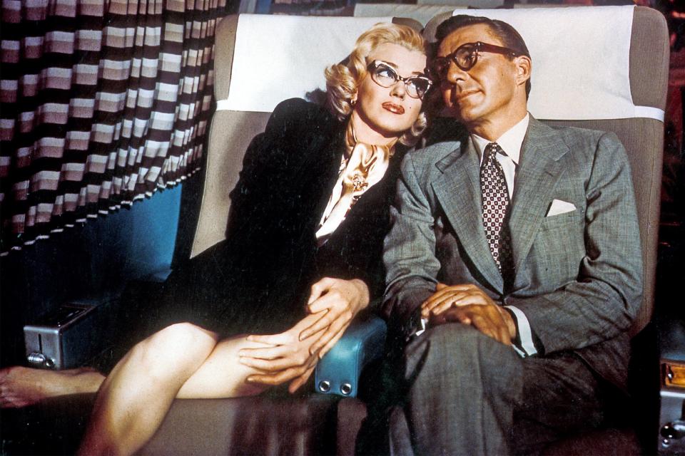 Marilyn Monroe and David Wayne in a scene from the film 'How To Marry A Millionaire', 1953. (Photo by 20th Century-Fox/Getty Images)