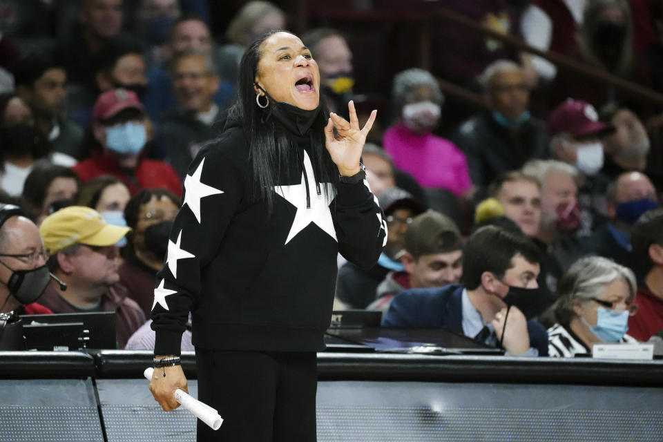 South Carolina head coach Dawn Staley communicates with players during the first half of an NCAA college basketball game against Stanford Tuesday, Dec. 21, 2021, in Columbia, S.C. South Carolina won 65-61. (AP Photo/Sean Rayford)