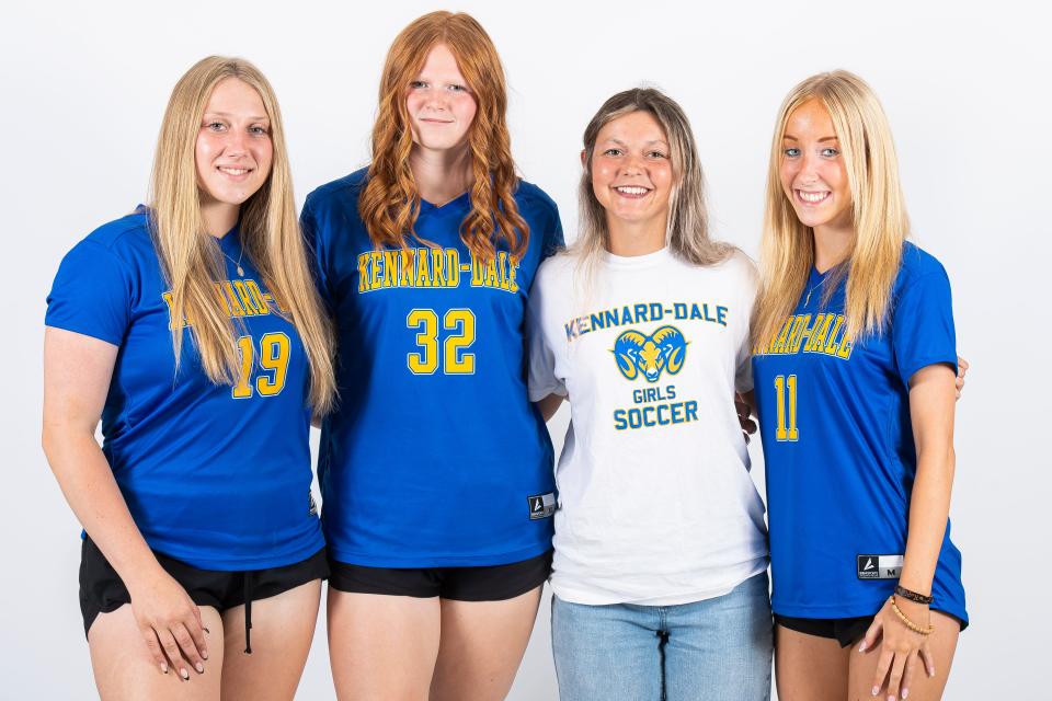 Kennard-Dale soccer players Kendalyn Quinan (19), Madison Hushon (32) and Sophia Manfredi (11) pose for a photo with head coach Kylee Barber during YAIAA fall sports media day on Thursday, August 3, 2023, in York.