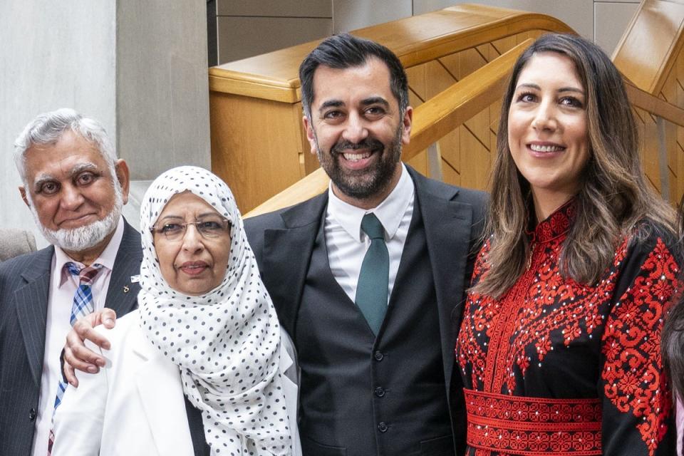 Humza Yousaf, with his wife Nadia El-Nakla, father Muzaffar Yousaf and mother Shaaista Bhutta the Garden Lobby after being voted the new First Minister at the Scottish Parliament in Edinburgh (Jane Barlow/PA) (PA Wire)