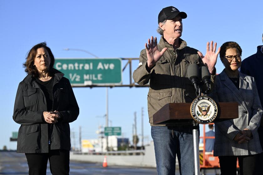 California Gov. Gavin Newsom, center, speaks alongside Vice President Kamala Harris, left, and Los Angeles Mayor Karen Bass about the I-10, which was closed by an underpass fire on Saturday, Nov. 11, 2023, in Los Angeles, Sunday, Nov. 19. (AP Photo/Alex Gallardo)