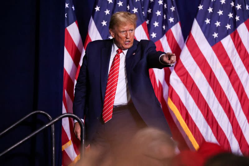 FILE PHOTO: Former U.S. President Trump hosts a campaign rally, in Rome, Georgia