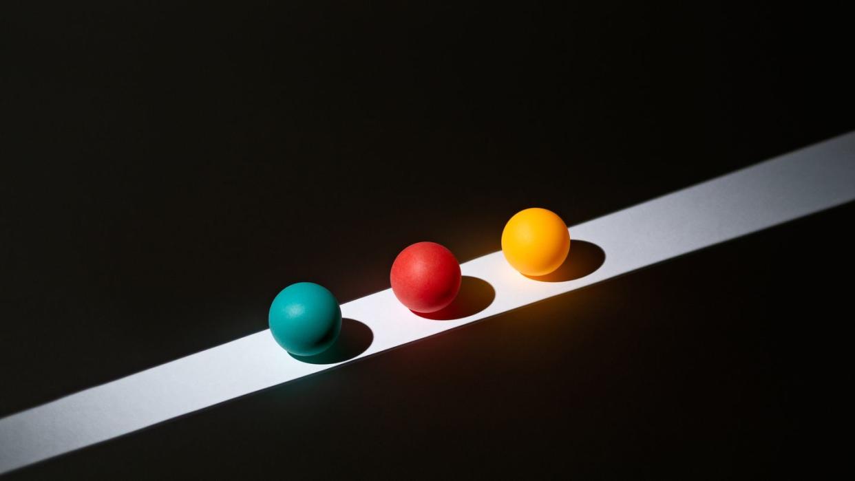 colorful spheres on light stripe