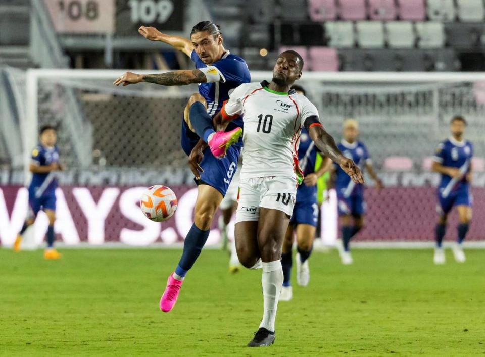 Puerto Rico defender Zarek Valentin (5) and Martinique forward Brighton Labeau (10) compete for the ball in the first half of their CONCACAF Gold Cup 2023 preliminary match at DRV PNK Stadium on Tuesday, June 20, 2023, in Fort Lauderdale, Fla.