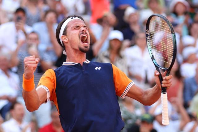 Fucsovics upsets Rublev in five to get a shot at Djokovic in the quarters