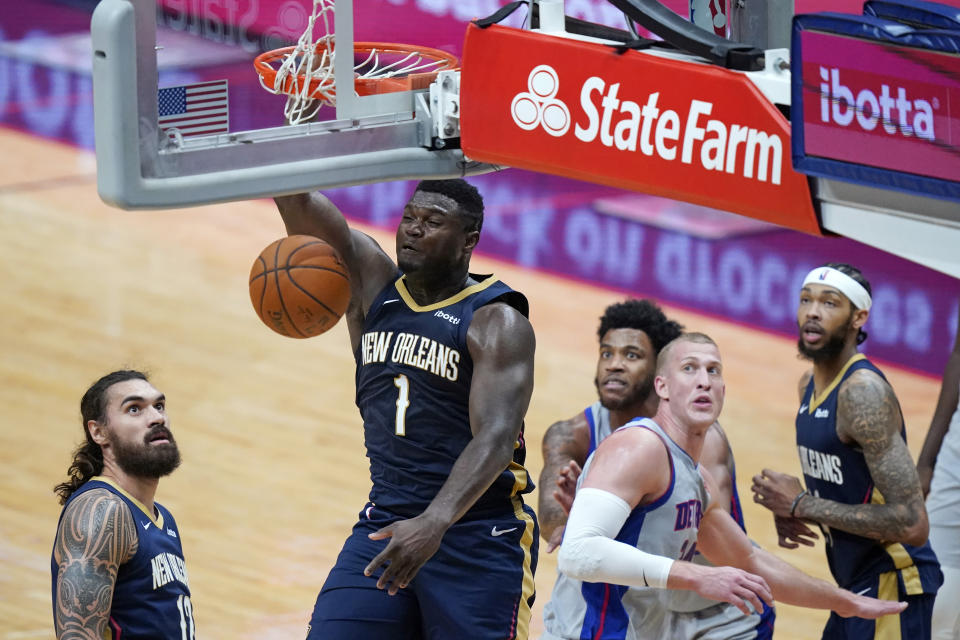 New Orleans Pelicans forward Zion Williamson (1) dunks during the second half of the team's NBA basketball game against the Detroit Pistons in New Orleans, Wednesday, Feb. 24, 2021. (AP Photo/Gerald Herbert)