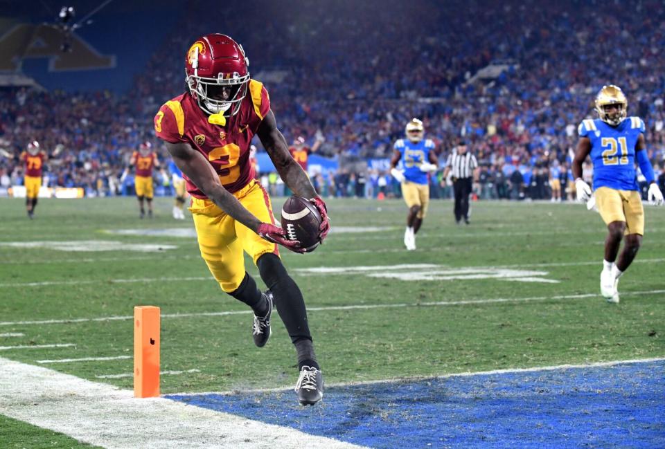 USC receiver Jordan Addison catches a touchdown pass against UCLA in the third quarter at the Rose Bowl.