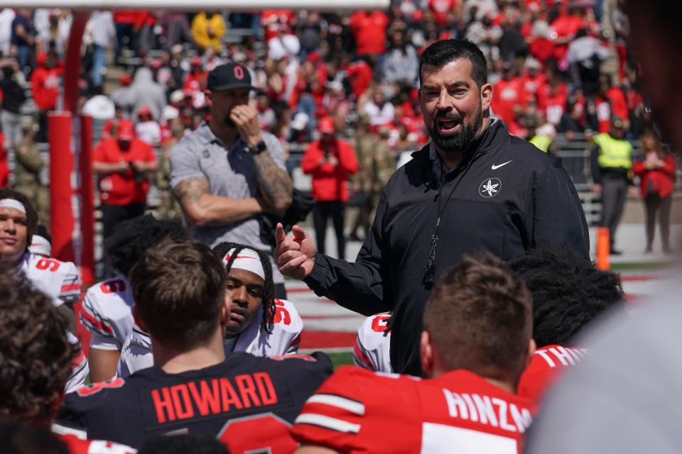 Apr 13, 2024; Columbus, OH, USA; Ohio State Buckeyes head coach Ryan Day talks with his players after the Ohio State football spring game at Ohio Stadium.