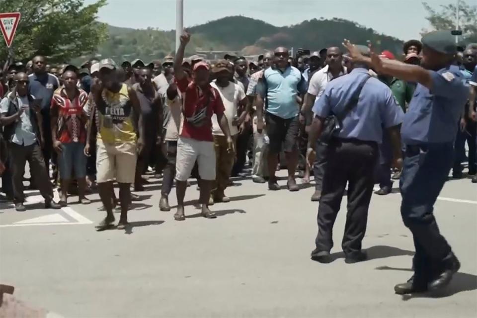 This image made from video shows a protest in Port Moresby, Papua New Guinea (AP)