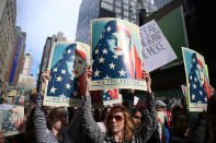 <p>A group of women hold up Munira Ahmed signs in the “I am a Muslim too” rally at Times Square in New York City on Feb. 19, 2017. (Gordon Donovan/Yahoo News) </p>