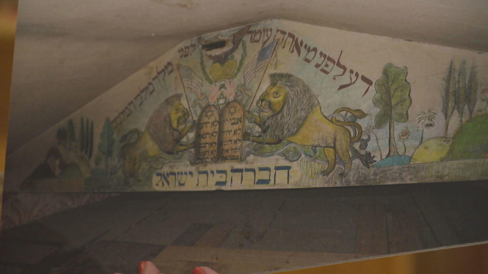 The 100-plus-year-old mural iwas found in the attic of an old building in North Adams. The building used to be a synagogue of the first Jewish Congregation in that town but has now been subdivided into apartments. / Credit: CBS Boston