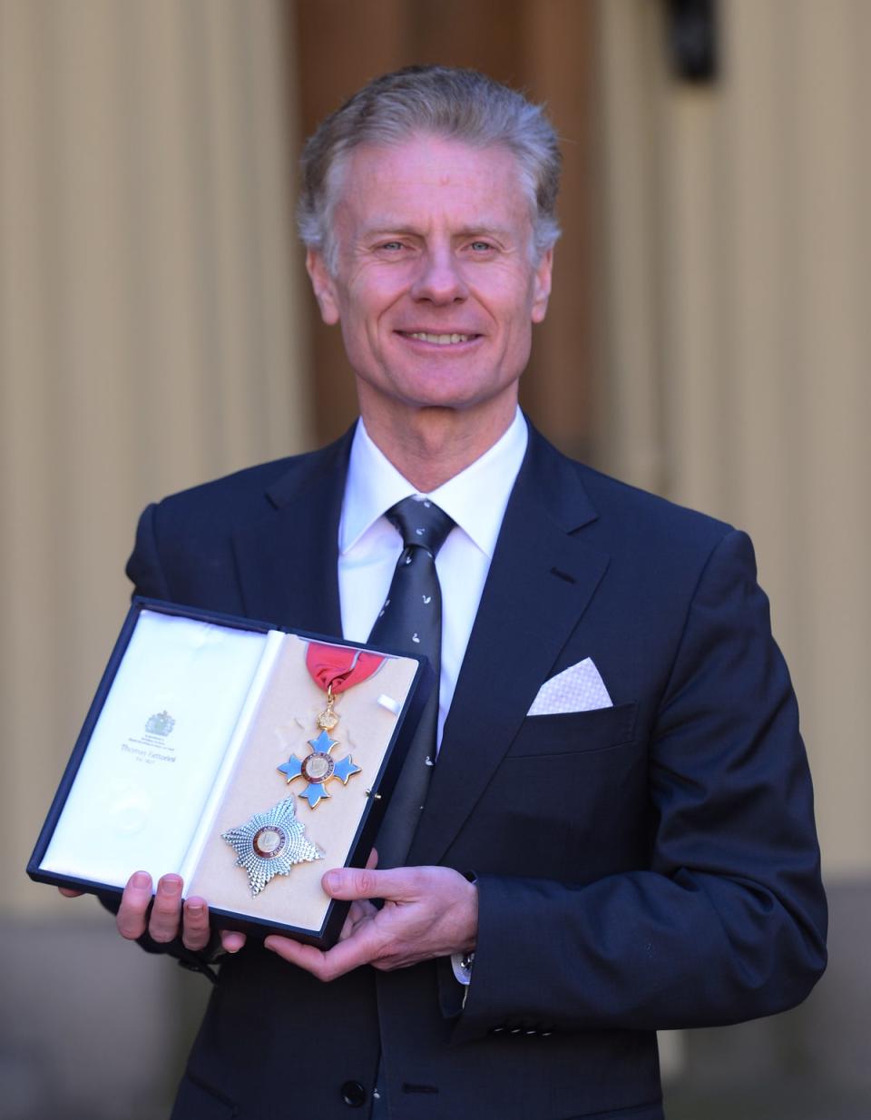 LOCOG Chief Executive, Lord Deighton poses at Buckingham Palace where he became a Knight Commander during an investiture ceremony on March 12, 2013 (Getty Images)