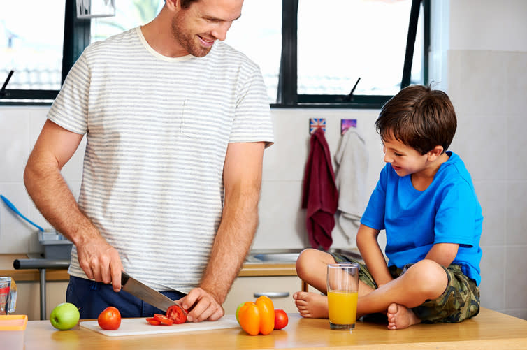 <span class="caption">Full-time caring dads are blazing a trial of different masculinity.</span> <span class="attribution"><a class="link " href="https://www.shutterstock.com/image-photo/happy-dad-son-making-healthy-food-195763775?src=2--NNo4XUq_3oRSDpQw3WQ-1-1" rel="nofollow noopener" target="_blank" data-ylk="slk:Daxiao Productions/Shutterstock;elm:context_link;itc:0;sec:content-canvas">Daxiao Productions/Shutterstock</a></span>