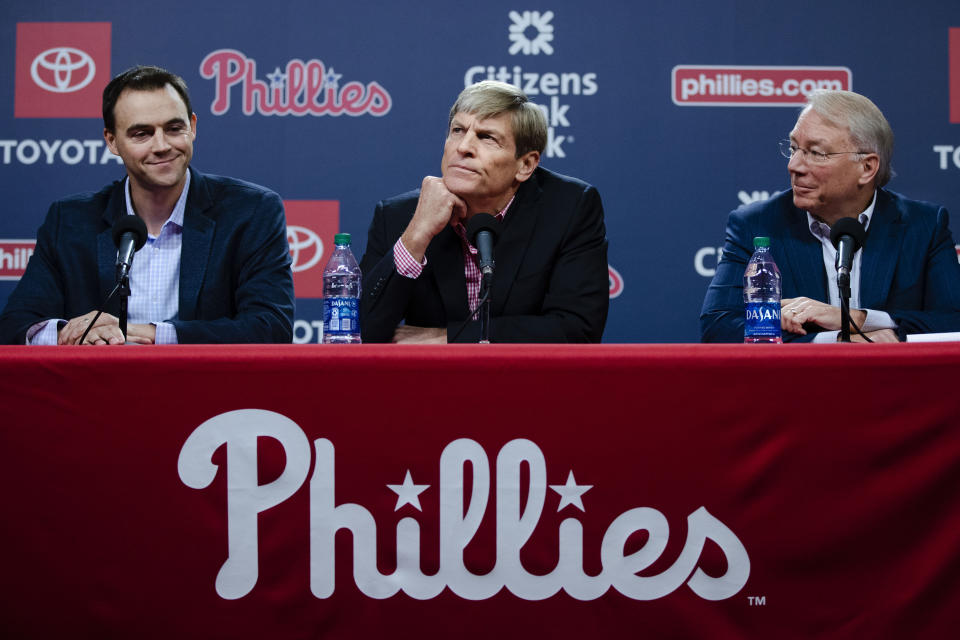 Philadelphia Phillies general manager Matt Klentak, left, managing partner John Middleton and president Andy MacPhail, right, hold a news conference in Philadelphia, Friday, Oct. 11, 2019. The Phillies fired baseball manager Gabe Kapler on Thursday. (AP Photo/Matt Rourke)