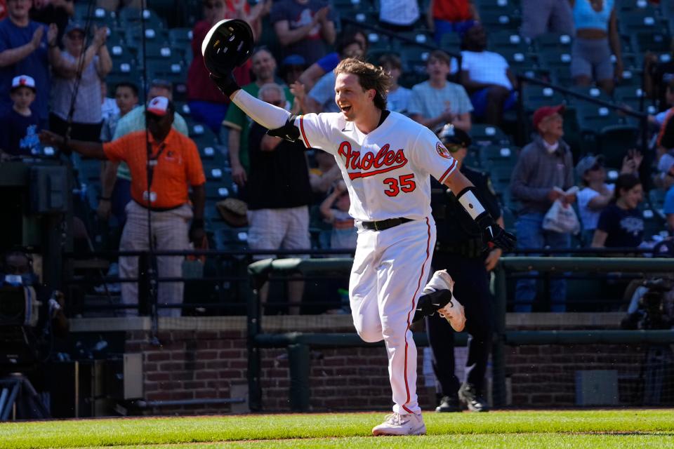 Baltimore Orioles catcher Adley Rutschman (35) celebrates hitting the game winning walk off home run during the ninth inning against the Oakland Athletics at Oriole Park at Camden Yards Apr 13, 2023, in Baltimore.