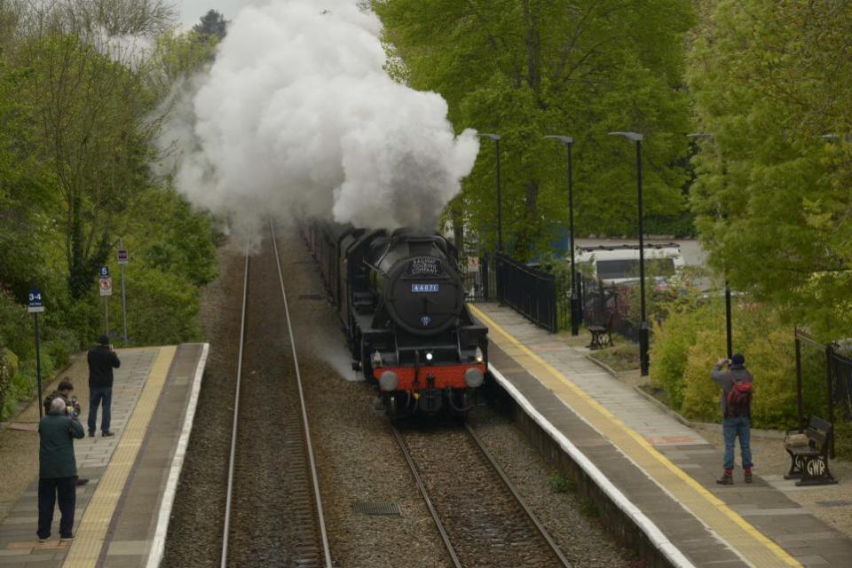 Wiltshire Times: The Black Five locomotive 44871 storms through Bradford on Avon station at speed on its trip back to London. Image: Trevor Porter 70012-6