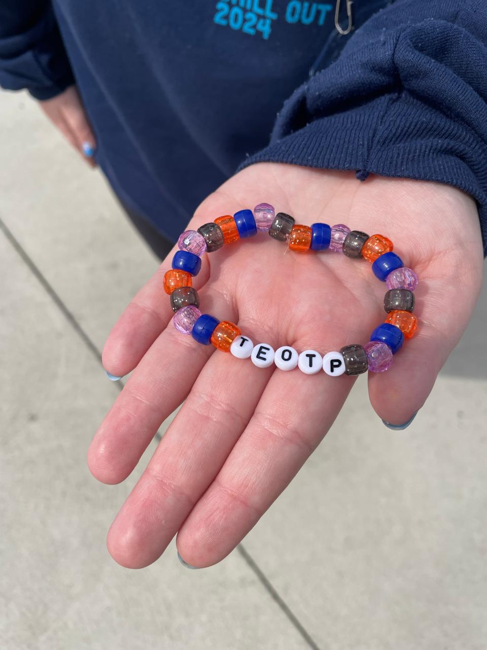 Kaitlyn LaPrade, 16, of Oregon, Ohio, made special friendship bracelets to mark Cedar Point's opening for the eclipse.