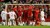 Football Soccer - Liverpool v FC Augsburg - UEFA Europa League Round of 32 Second Leg - Anfield, Liverpool, England - 25/2/16 FC Augsburg's Konstantinos Stafylidis shoots from a free kick Reuters / Andrew Yates Livepic EDITORIAL USE ONLY.