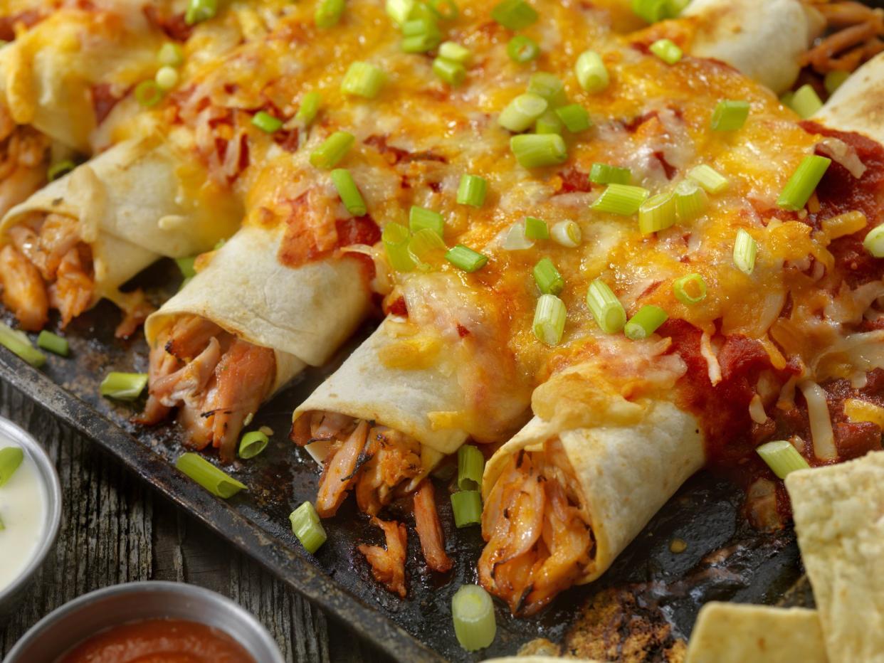 Baked Chicken Enchiladas with Salsa, Cheese and Green Onions