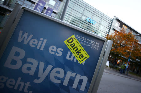 A "Thank You" sticker is attached to a Christian Social Union (CSU) election campaign poster in front of their headquarters in Munich, Germany October 15, 2018. REUTERS/Michael Dalder