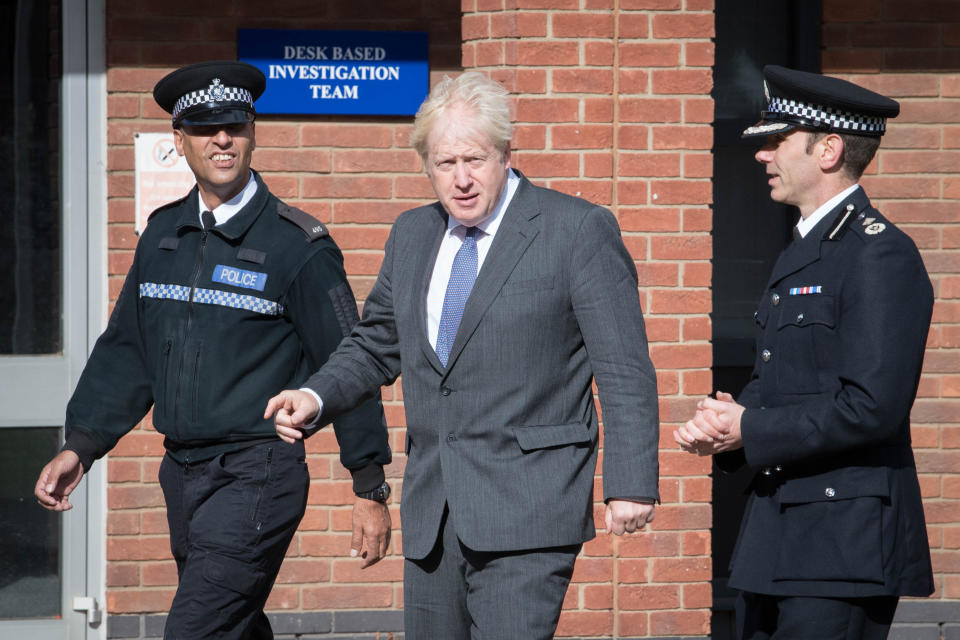 Prime Minister Boris Johnson during a visit to Northamptonshire Police Headquarters in Northampton with Deputy Chief Constable, Simon Nickless (right) where he met new recruits and saw a class training in first aid.