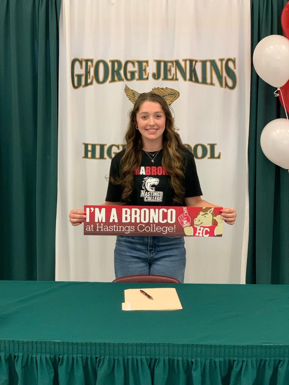 George Jenkins' Alyssa Currie signed the first bowling scholarship in school history.