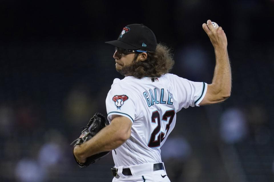 Arizona Diamondbacks starting pitcher Zac Gallen throws against the Oakland Athletics during the first inning of a baseball game Tuesday, April 13, 2021, in Phoenix. (AP Photo/Ross D. Franklin)