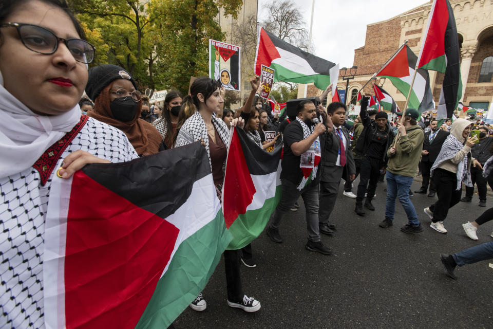 Pro-Palestinian demonstrators march down J Street during a protest in conjunction with the 2023 California Democratic Party Convention, Saturday, Nov. 18, 2023, in Sacramento, Calif. (Paul Kitagaki Jr./The Sacramento Bee via AP)