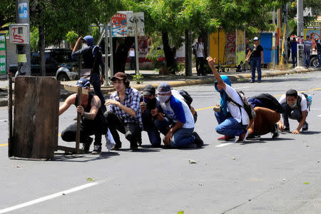 University students take part in a protest against reforms that implement changes to the pension plans of the Nicaraguan Social Security Institute (INSS) in Managua, Nicaragua April 19,2018. REUTERS/Oswaldo Rivas