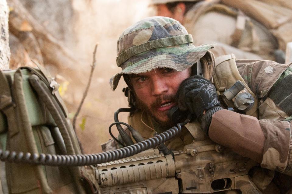 This photo released by Universal Pictures shows Emile Hirsch as Danny Dietz in a scene from the film, “Lone Survivor." (AP Photo/Universal Pictures, Gregory R. Peters)